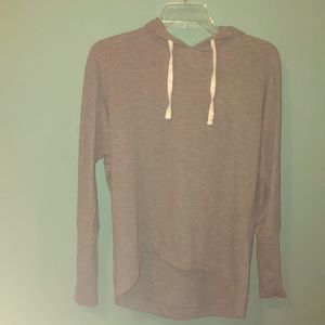 Hooded grey top.